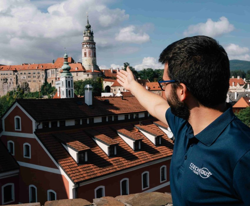 Local guide overlooking Český Krumlov old town during a small-group Prague day tour
