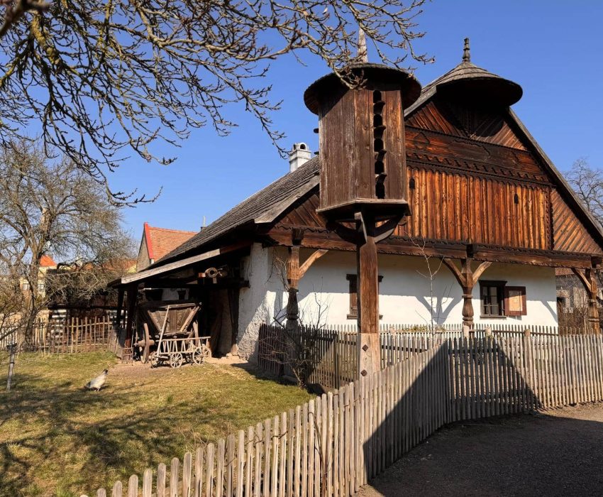 Traditional Czech log house countryside architecture with blue sky