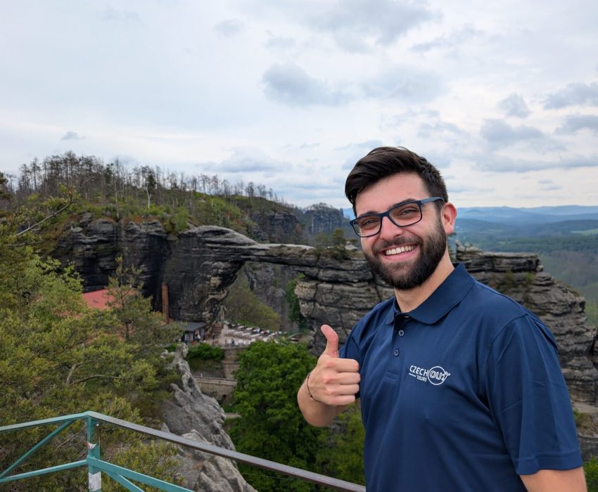 Tour guide smiling at viewpoint in Bohemian Switzerland